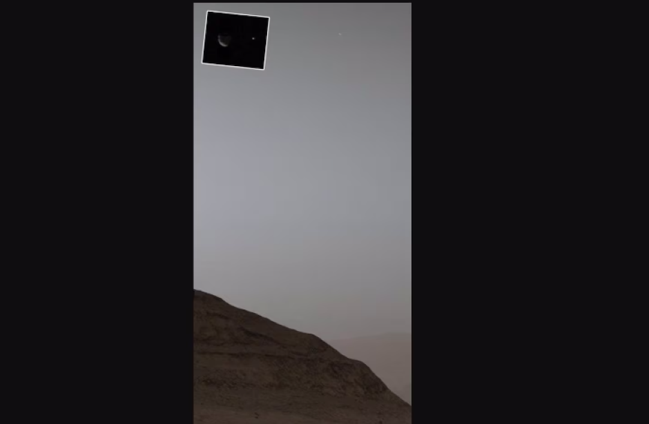 Foto del Curiosity desde Marte. Arriba a la izquierda, la luna Fobos y, en pequeño, la Tierra