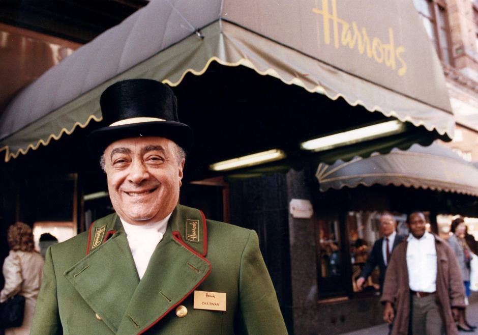 Mandatory Credit: Photo by Denis Jones/Evening Standard/Shutterstock (1036773a)
Owner Of Harrods Mohamed Al Fayed Pictured Wearing A Doorman Uniform Outside Harrods Department Store.
Owner Of Harrods Mohamed Al Fayed Pictured Wearing A Doorman Uniform Outside Harrods Department Store.
