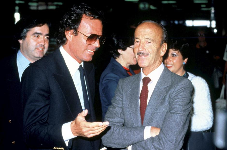 Spain Singer Julio Iglesias and Dr. Puga Iglesias (father of Julio Iglesias) attend the communion of the former's youngest son and receive a prize from the "El Tiempo" newspaper. Madrid, SPAIN - 05/1984.