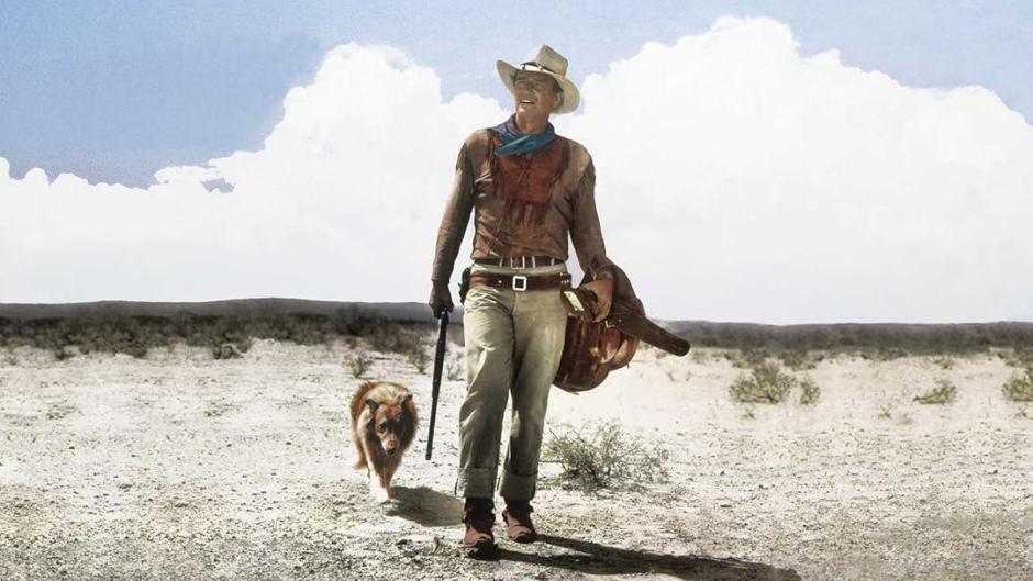 John Wayne, en el rodaje de Hondo