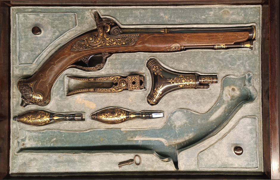 Estuche de pistolas de duelo con una sola pistola y sus accesorios