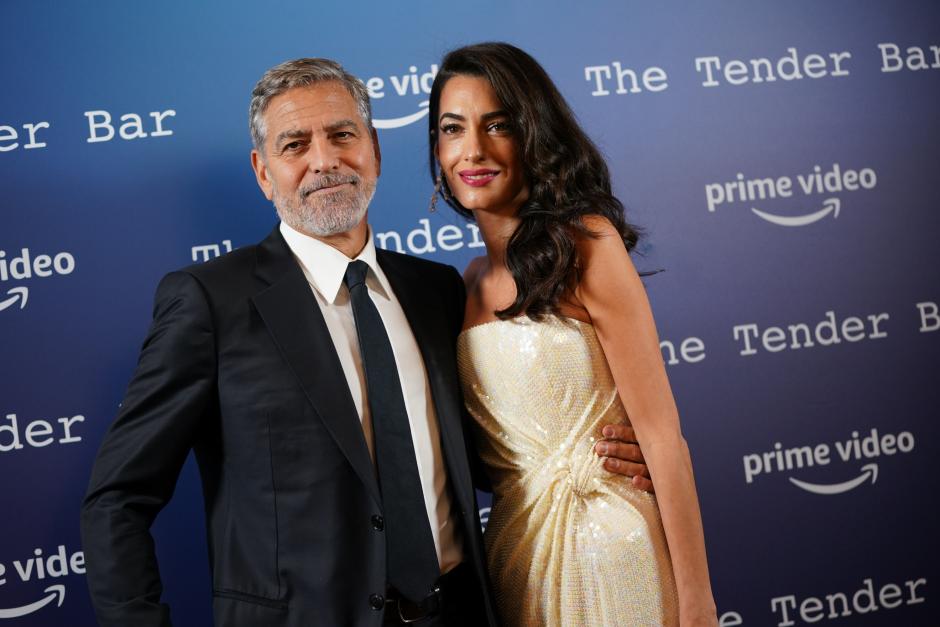 George Clooney with Amal Alamuddin during a photo call for the Tender Bar, during the BFI London Film Festival. Picture date: Sunday October 10, 2021. *** Local Caption *** .