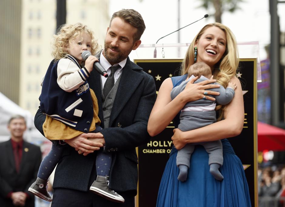 Actor Ryan Reynolds poses with his wife, actress Blake Lively, their daughter James, left, and their youngest daughter during a ceremony to award him a star on the Hollywood Walk of Fame on Thursday, Dec. 15, 2016, in Los Angeles.