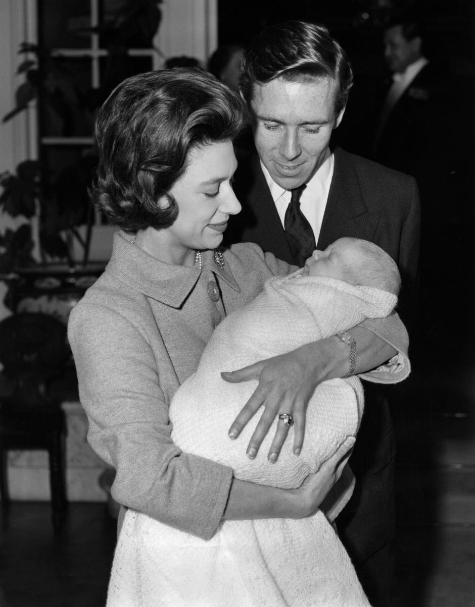 Picture taken on November 30, 1961 at London showing Princess Margaret and her husband the Earl Snowdon leaving Clarence House with her baby son David. (Photo by - / CENTRAL PRESS PHOTO LTD / AFP)