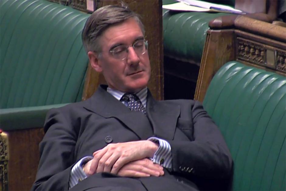A video grab from footage broadcast by the UK Parliament's Parliamentary Recording Unit (PRU) shows Britain's Leader of the House of Commons Jacob Rees-Mogg relaxing during the Standing Order 24 emergency debate on a no-deal Brexit in the House of Commons in London on September 3, 2019. - Prime Minister Boris Johnson was braced for a showdown with parliament on Tuesday over his Brexit plan that could spark a snap election and derail Britain's exit from the European Union next month. (Photo by - / PRU / AFP) / RESTRICTED TO EDITORIAL USE - MANDATORY CREDIT " AFP PHOTO / PRU " - NO USE FOR ENTERTAINMENT, SATIRICAL, MARKETING OR ADVERTISING CAMPAIGNS - EDITORS NOTE THE IMAGE HAS BEEN DIGITALLY ALTERED AT SOURCE TO OBSCURE VISIBLE DOCUMENTS
