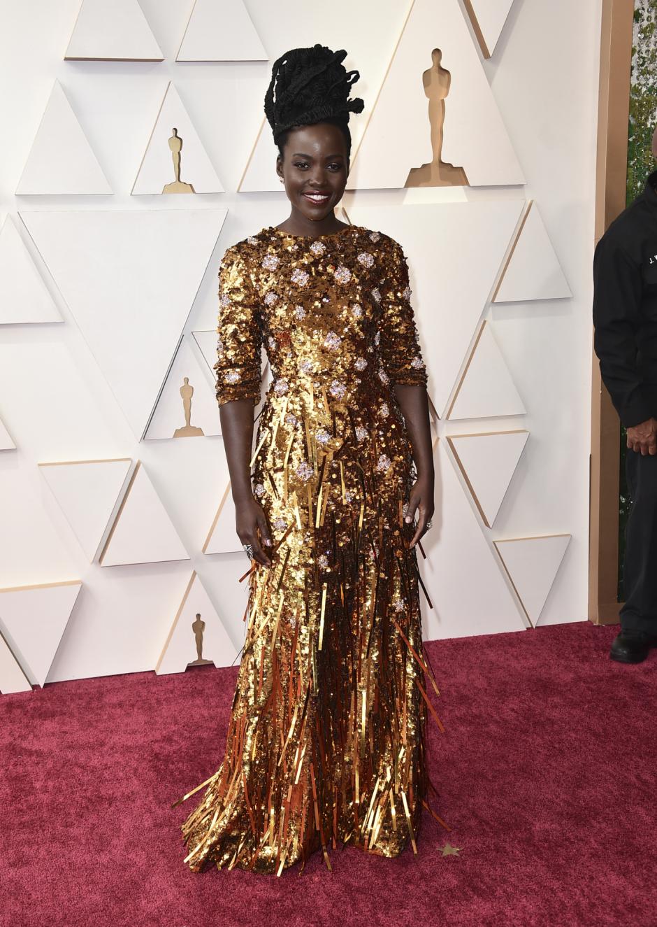 Demi Singleton arrives at the Oscars on Sunday, March 27, 2022, at the Dolby Theatre in Los Angeles. (Photo by Jordan Strauss/Invision/AP) *** Local Caption *** .