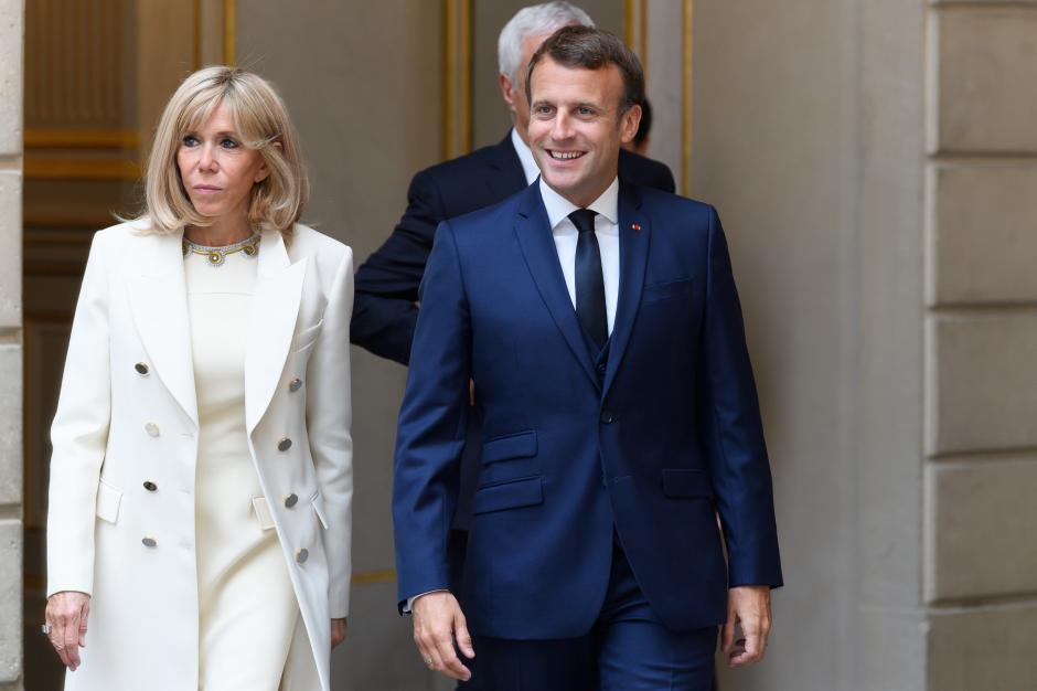 French President Emmanuel Macron and his wife Brigitte Macron during a reception on local food trade at the ElyseePalace.