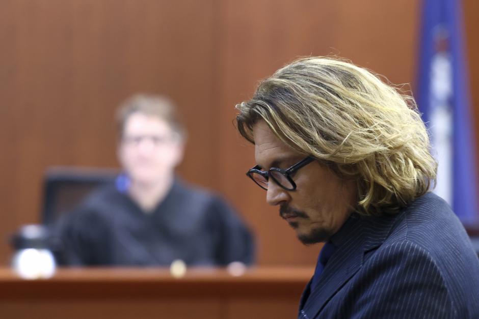 Actor Johnny Depp appears in the courtroom at the Fairfax County Circuit Courthouse during a trial in Fairfax, Va., Wednesday, April 13, 2022.