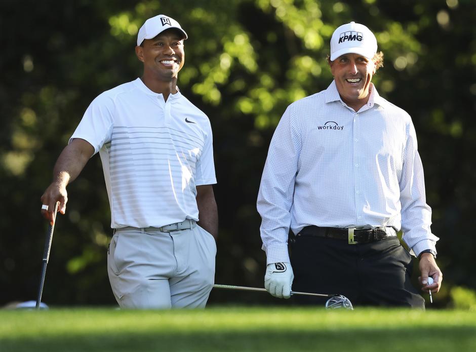 Tiger Woods y Phil Mickelson durante una práctica en Augusta