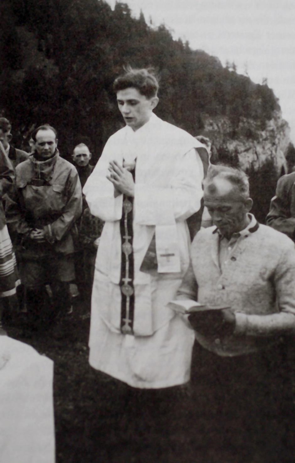 In this photo released by the German Catholic News Agency KNA and dated from summer 1952 German Joseph Cardinal Ratzinger, center, is seen celebrating Mass in the mountains of Ruhpolding, southern Germany.
