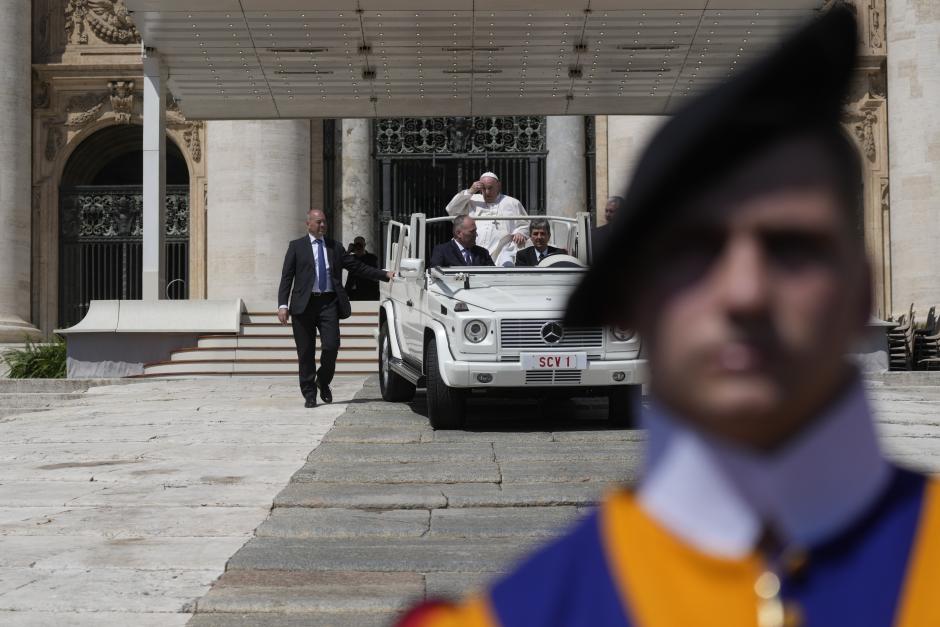 Pope Francis leaves St. Peter's Square at the end of his weekly general audience at the Vatican, Wednesday, May 11, 2022. (AP Photo/Gregorio Borgia)