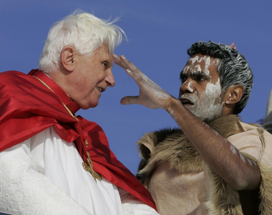 Pope Benedict XVI talks to an Australian Aborigine aboard a harbor cruise in Sydney, Australia, Thursday, July 17, 2008. (AP Photo/Gregorio Borgia)© RADIAL PRESS