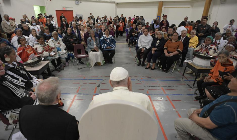 Pope Francis meets with residential school alumni at Nakasuk Elementary School Square in Iqaluit, Nunavut, Canada, on July 29, 2022. - Pope Francis flew to the Canadian Arctic Friday to meet Inuit survivors of Catholic-run schools where Indigenous children were abused over a span of decades, in the final stop of a landmark tour apologizing for the Church's role.
The 85-year-old pontiff travelled to the vast northern territory of Nunavut's capital, Iqaluit, which means "the place of many fish." Residents greeted him with traditional music including throat singing on a stage set up beneath an overcast sky. (Photo by Vincenzo PINTO / AFP)