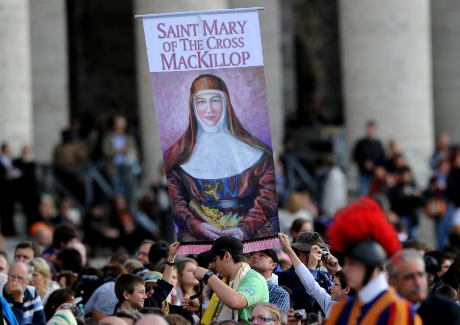 Tens of thousands of faithful attended an open-air canonization ceremony in Saint Peter's Square at the Vatican, in Rome, Italy, on October 17, 2010.
Pictured: The tapestry of Saint Mary of the Cross Mckillop