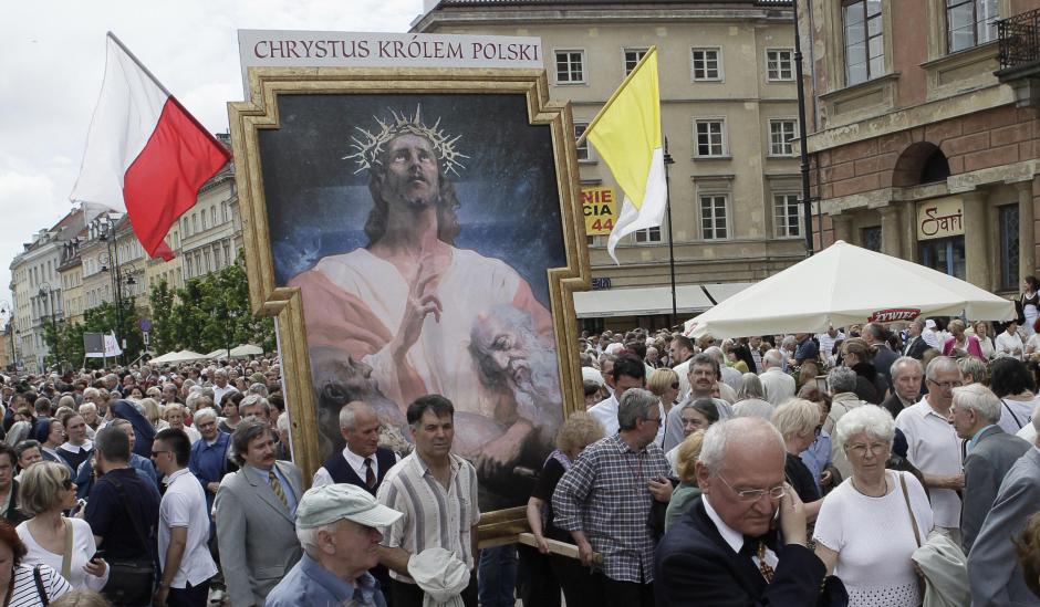 People attend celebrations of Corpus Christi procession in Warsaw,Poland, on Thursday, June 3, 2010.