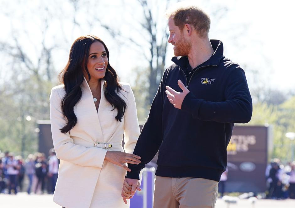 Prince Harry and Meghan Markle, Duke and Duchess of Sussex, attend the track and field event at the Invictus Games in The Hague, Netherlands, Sunday, April 17, 2022.