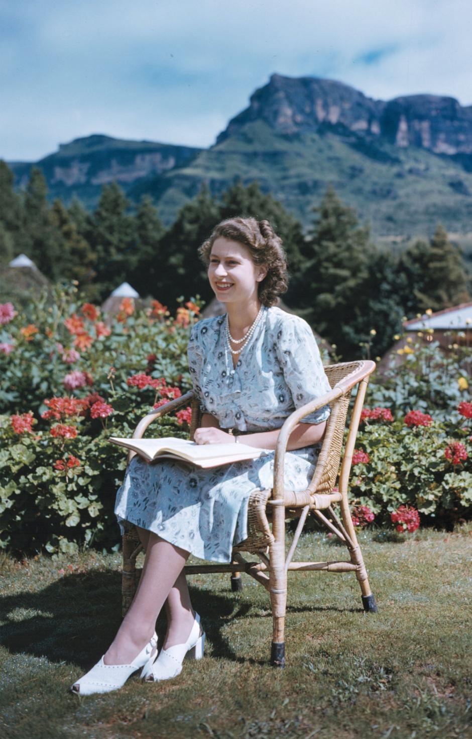 Britain's Princess Elizabeth, later Queen Elizabeth II, on her 21st birthday, seated in Natal National Park, South Africa, April 21, 1947. In the background are the Drakenberg Mountains.