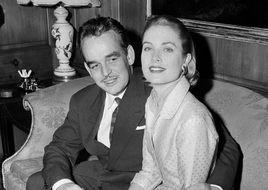 FILE - This Jan. 5, 1956 file photo shows American actres Grace kelly, right, with Prince Rainier III of Monaco in the home of Miss Kelly's parents in Philadelphia. Pennsylvania's James A. Michener Museum is hosting an exhibit that traces the Kelly's life from growing up in Philadelphia to starring in films and marrying Prince Rainier III. It opens at the museum on Oct. 31 and runs through Jan. 26, 2014. (AP Photo, file)
