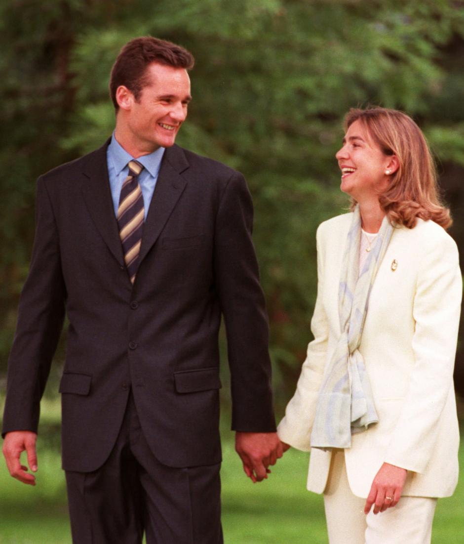 Spanish Princess Cristina and her fiancee Inaki Urdangarin walk hand in hand in Madrid Saturday May 3, 1997. The couple posed together for the first time since announcing their intention to marry.