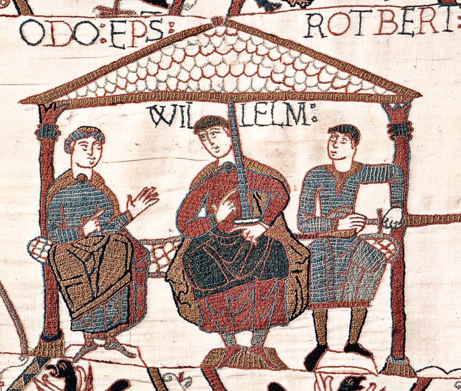 Escena del Tapiz de Bayeux que muestra a Guillermo y a sus medio hermanos. Guillermo se sienta en el centro, Odón a la izquierda con las manos levantadas y Roberto a la derecha portando una espada