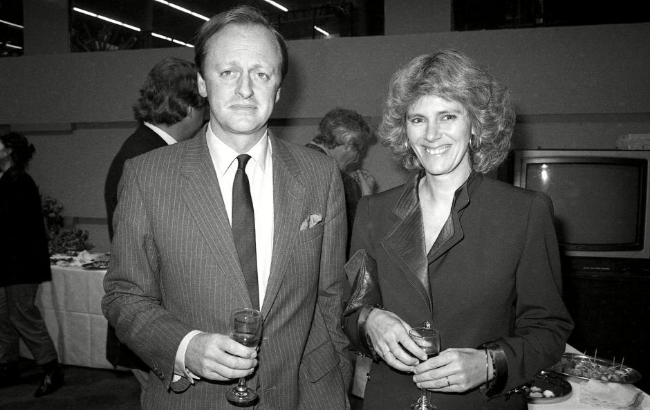 Mandatory Credit: Photo by Alan Davidson/Shutterstock (7529110p)
Launch Party For the Book 'Catwalk' Andrew Parker Bowles with His Wife Camilla Parker Bowles (duchess of Cornwall)
Launch Party For Marie Helvin's Book 'Catwalk' - 17 Oct 1985 
LAUNCH PARTY FOR MARIE HELVIN'S BOOK CATWALK 17 OCT 1985 ANDREW PARKER BOWLES WITH HIS WIFE CAMILLA DUCHESS CORNWALL POSED HORIZONTAL HALF LENGTH EYE CONTACT BW Personality 50362498