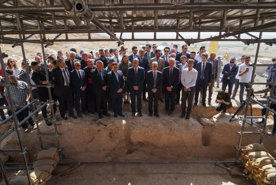 Attendees listen to information on an ancient irrigation canal dating back to Assyrian times, in the archaeological site of Faydeh (Faida) in the mountains near the town of the same name in the autonomous Kurdish region of Iraq, on October 16, 2022, during the opening of the first phase of a planned archaeological park in Iraqi Kurdistan. (Photo by Ismael ADNAN / AFP)