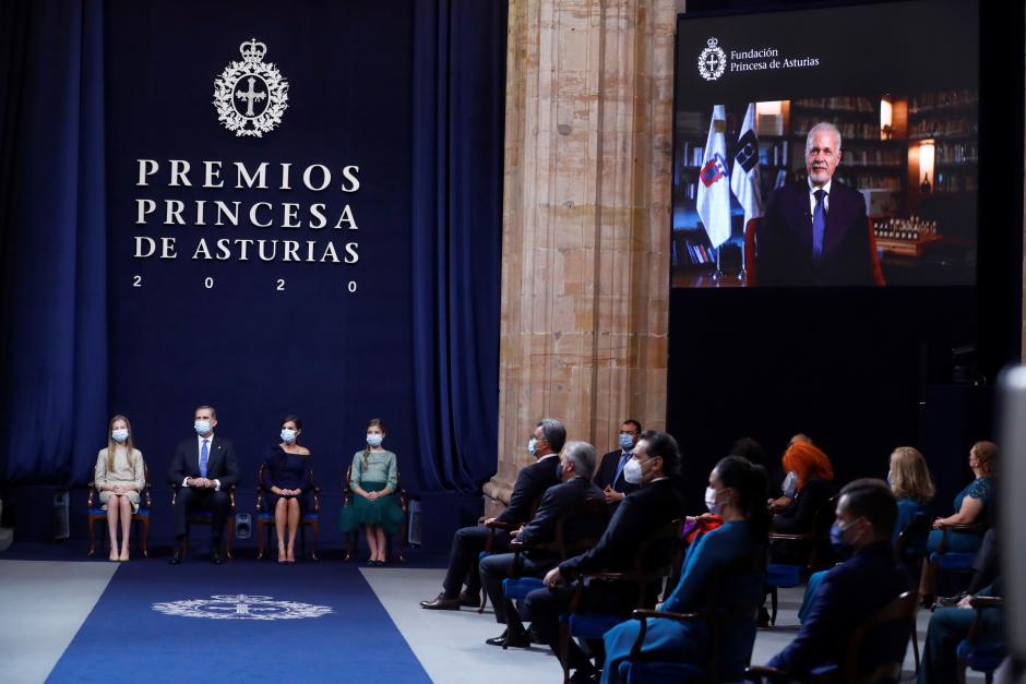 Spain's Crown Princess Leonor, King Felipe VI, Queen Letizia and Princess Sofia listen to the speech given by the president of the International Book Fair of Guadalajara, Raul PAdilla Lopez (on screen), laureate of the Princess of Asturias Award for Communication and Humanities during the delivery of Princess of Asturias Awards 2020, in Oviedo, on Friday 16 October 2020.