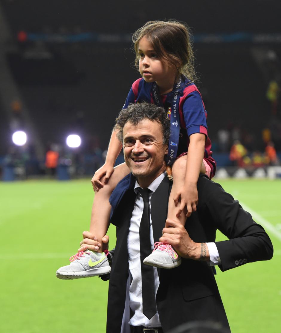 Barcelona's head coach Luis Enrique and his daughter  Xana celebrate after winning the UEFA Champions League final soccer match between Juventus FC and FC Barcelona at Olympiastadion in Berlin, Germany, 06 June 2015.
