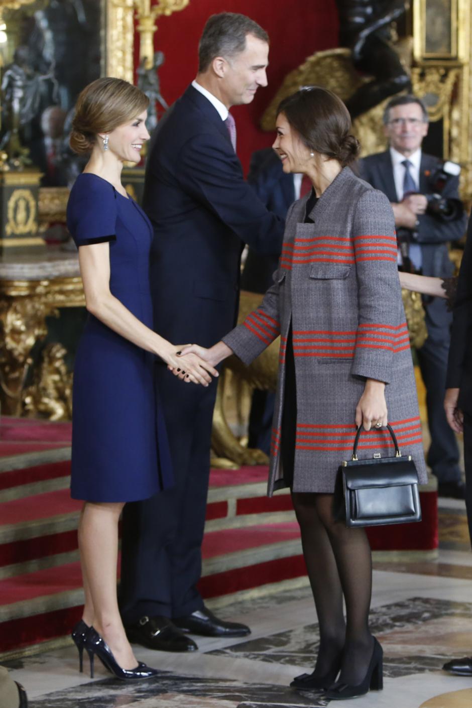 King Felipe VI of Spain and Queen Letizia with stylist Eva Fernandez attending a reception at Royal Palace during the known as Dia de la Hispanidad, Spain's National Day, in Madrid, on Monday 12 October, 2015