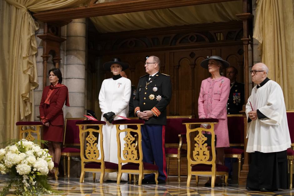 Prince Albert of Monaco, center right, and Princess Charlene, second left, with Princess Caroline of Hanover, left, and Princess Stephanie of Monaco, second right, attend a mass ceremony at the Monaco cathedral as part of ceremonies marking National Day, in Monaco, Saturday Nov.19, 2022. (AP Photo/Daniel Cole, Pool) *** Local Caption *** .