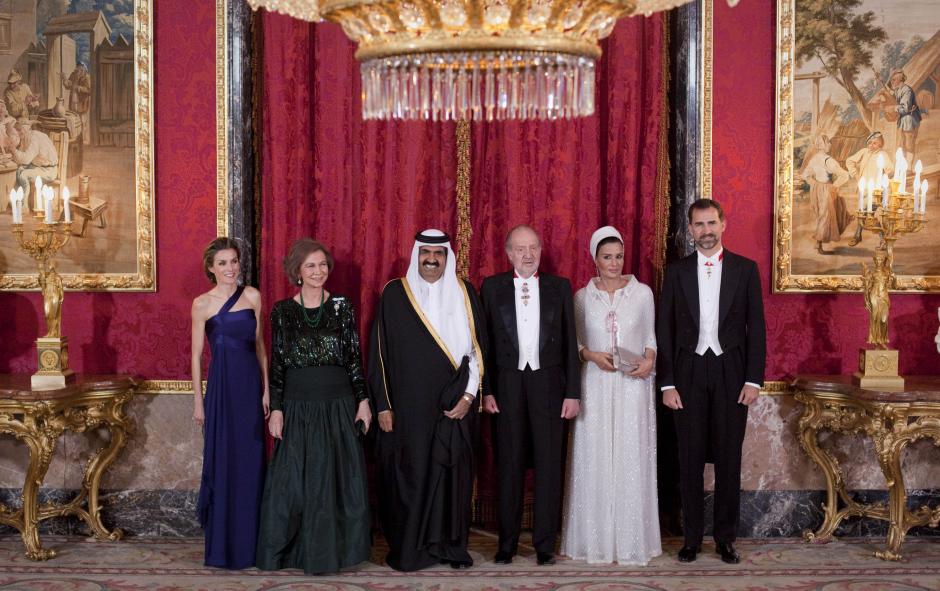 Spain's Princess Letizia, left, Spain's Queen Sofia, 2nd left, Qatar's Emir Sheik Hamad bin Khalifa Al Thani, center left, Spain's King Juan Carlos, center right, Qatar's Emir wife Sheika Mozah bint Nasser al-Missned, 2nd right, and Spain's Prince Felipe, right, pose before their gala dinner at the Royal Palace in Madrid, on Monday, April 25, 2011.