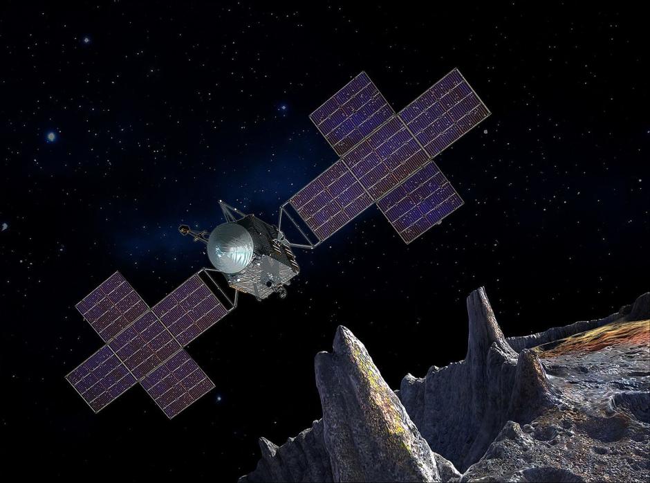 La sonda Psique inspecciona el asteroide del mismo nombre, en una recreación artística