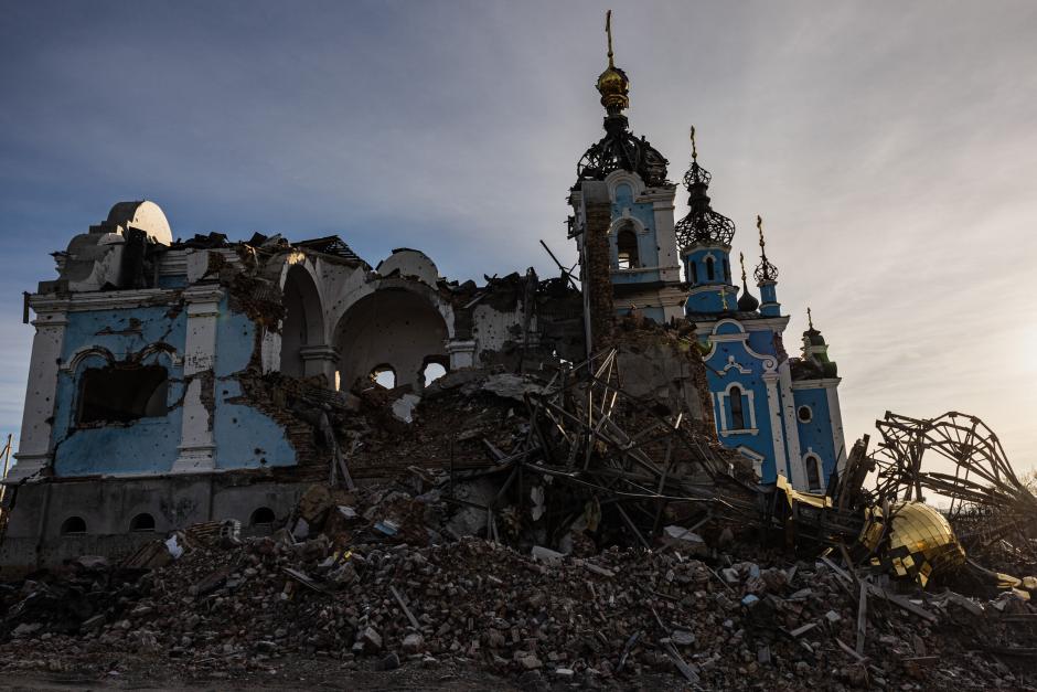 This photograph taken on December 20, 2022, shows a destroyed church in the village of Bohorodychne, eastern Ukraine. - Bohorodychne is a village in Donetsk region that came under heavy attack by Russian forces in June 2022, during the Russian invasion of Ukraine. On August 17, 2022 the Russian forces captured the village. The Armed Forces of Ukraine announced on September 12, 2022 that they took back the control over the village. A few resident came back to restore their destroyed houses and live in the village. (Photo by Sameer Al-DOUMY / AFP)