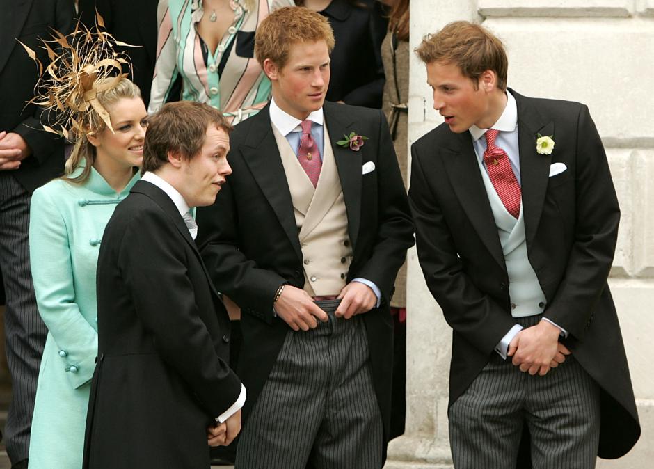 Britain's Prince William, right, and Prince Harry, second from right, chat to Camilla Duchess of Cornwall's children Tom and Laura Parker Bowles, as  Britain's Prince Charles and his new wife Camilla, Duchess of Cornwall, unseen, leave the Guildhall in Windsor, England after their civil wedding ceremony, Saturday, April 9, 2005,