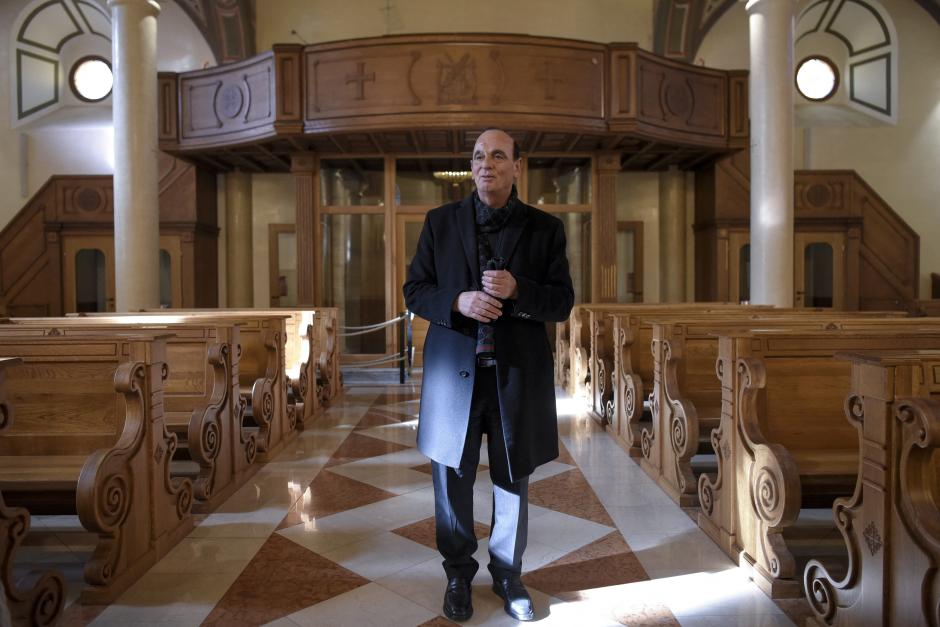 Vicar general of the diocese of Prizren-Pristina Shan Zefi poses at the Catholic Cathedral of Our Lady of Perpetual Succour, in Prizren on February 2, 2023. - In an austere church perched above a picturesque valley in central Kosovo, Ismet Sopi recounts how his family hid their Catholic faith for centuries, after converting to Islam during the Ottoman conquest of the Balkans.
For generations, his forebears maintained their religious convictions secretly, he explains, until 2008 when Sopi and his family openly embraced their Catholicism and were baptised together. (Photo by Armend NIMANI / AFP)