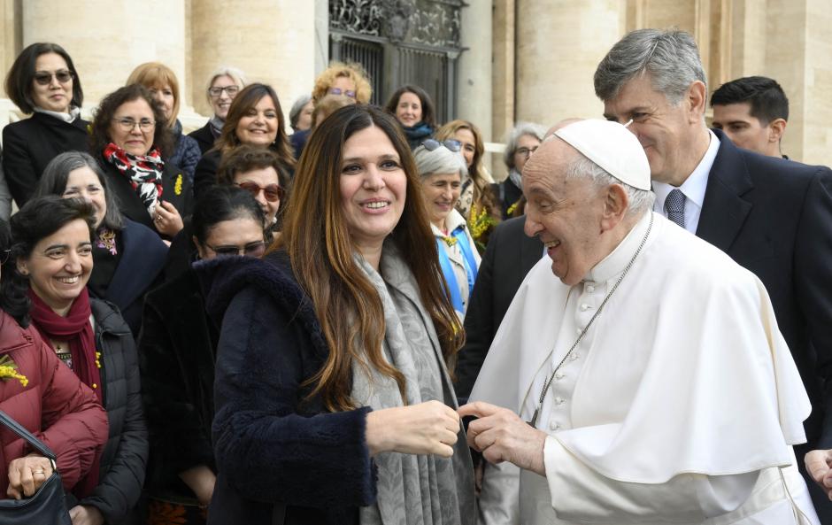 This photo taken and handout on March 8, 2023 by The Vatican Media shows Pope Francis meeting with a group of women from the World Union of Catholic Women's Organisations (UMOFC), during the weekly general audience on March 8, 2023 at St. Peter's square in The Vatican. (Photo by Handout / VATICAN MEDIA / AFP) / RESTRICTED TO EDITORIAL USE - MANDATORY CREDIT "AFP PHOTO / VATICAN MEDIA" - NO MARKETING NO ADVERTISING CAMPAIGNS - DISTRIBUTED AS A SERVICE TO CLIENTS