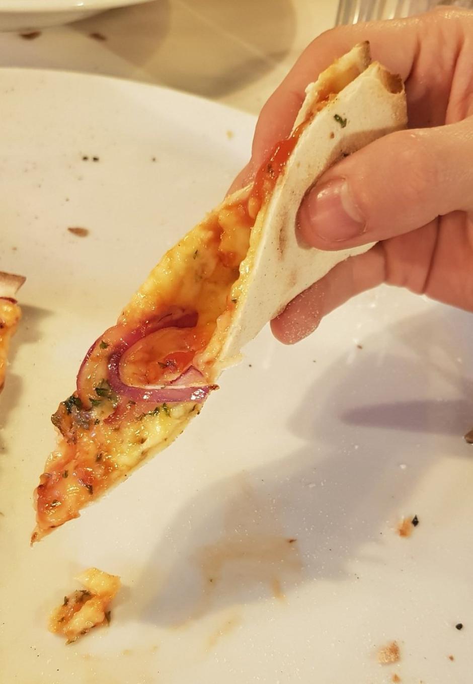 La forma correcta de comer 'pizza al taglio'