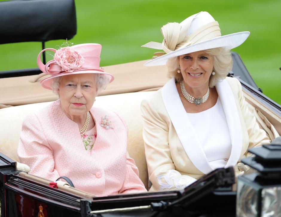 Britain's Queen Elizabeth II with Camilla, Duchess of Cornwall during the first day of the Royal Ascot race meeting in Ascot, England, Tuesday, June 18, 2013.