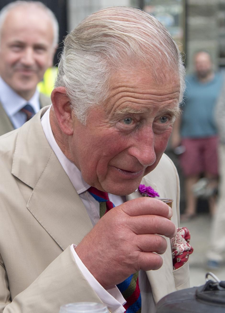 Prince Charles of Wales during their visit to Tavistock, Devon, to celebrate the town's recent restoration to its historic buildings and attend the town's Community Festival of Food and Crafts, as part of their visit to Devon. *** Local Caption *** .