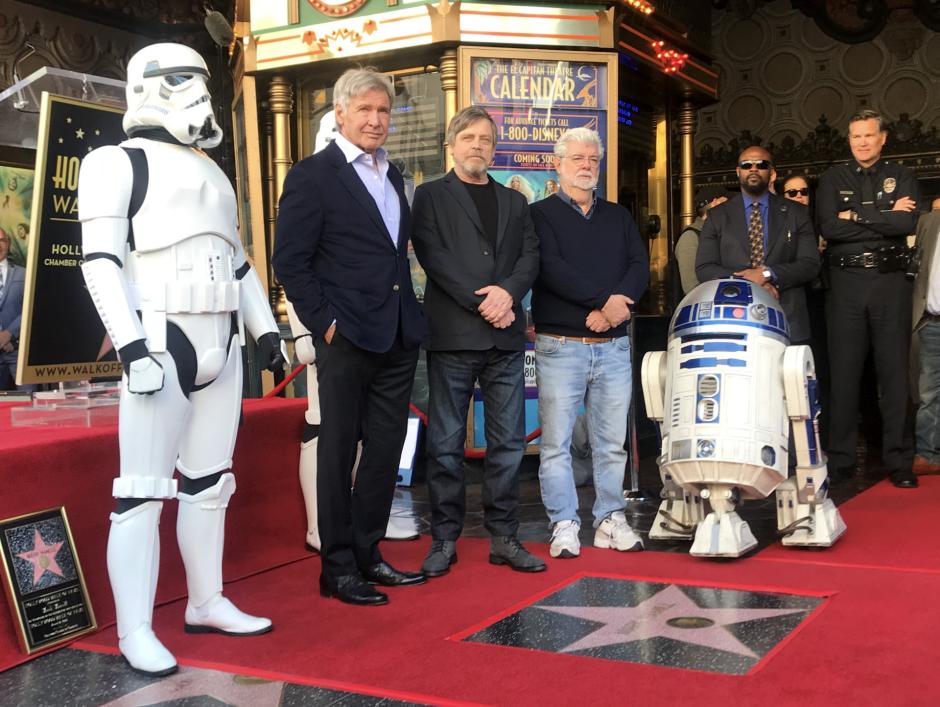 Harrison Ford and George Lucas with Mark Hamill ( with Stormtrooper , R2D2 )Receives His Hollywood Walk Of Fame Star. March 9, 2018