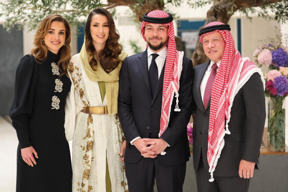 Jordan's Queen Rania (left) and King Abdullah II (right) pose with their eldest son, Crown Prince Hussein (or Al Hussein) bin Abdullah II and his fiancee Rajwa Khaled bin Musaed bin Saif bin Abdulaziz Al Saif during his engagement ceremony Jordan's Crown Prince Engagement  in Riyadh, Saudi Arabia, on August 17, 2022.
