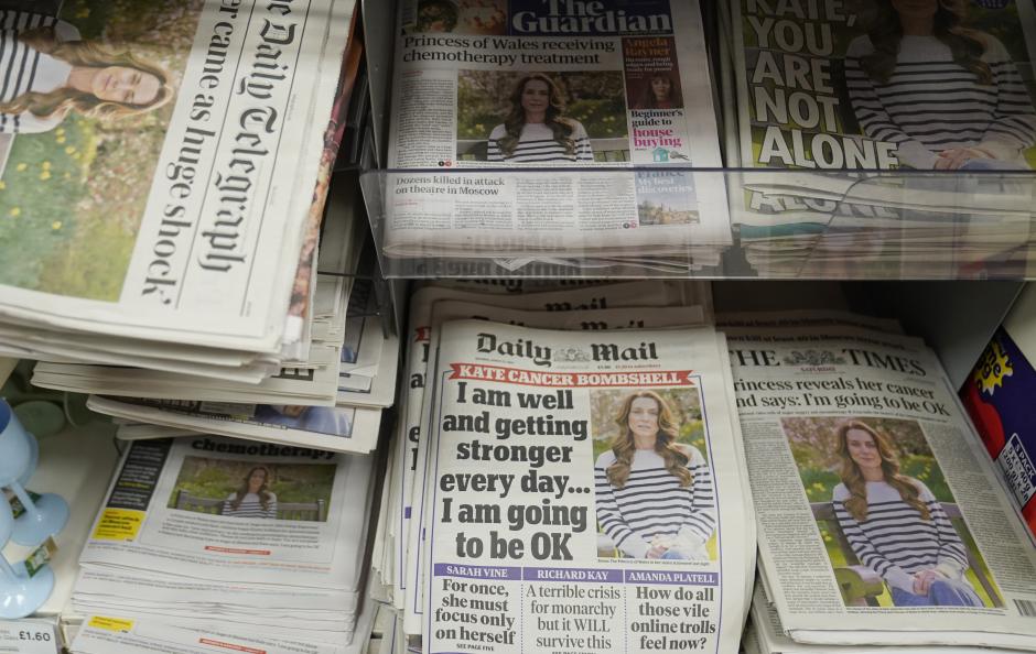 Front pages of national newspapers on display at a newsagents in north London showing the news of the Princess of Wales cancer diagnosis. Picture date: Saturday March 23, 2024.