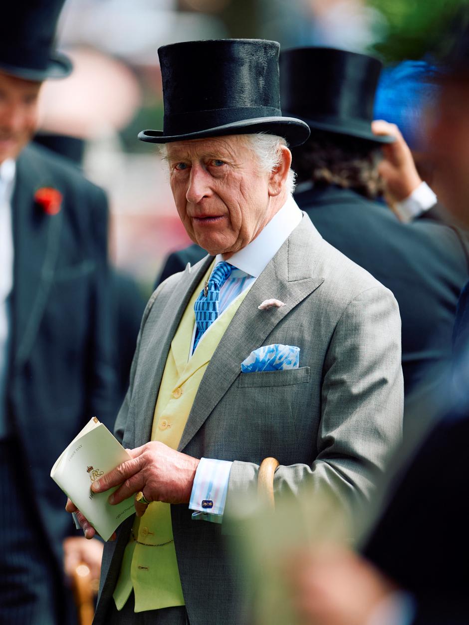 Britain's King Charles III reacts as he arrives to attend the first day of the Royal Ascot horseracing meeting in Ascot, west of London, on June 18, 2024. (Photo by BENJAMIN CREMEL / AFP)