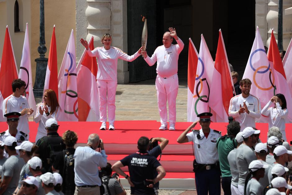 Prince Albert II of Monaco and Princess Charlene of Monaco attending the Olympic flame lighting on June 18, 2024 in Monaco