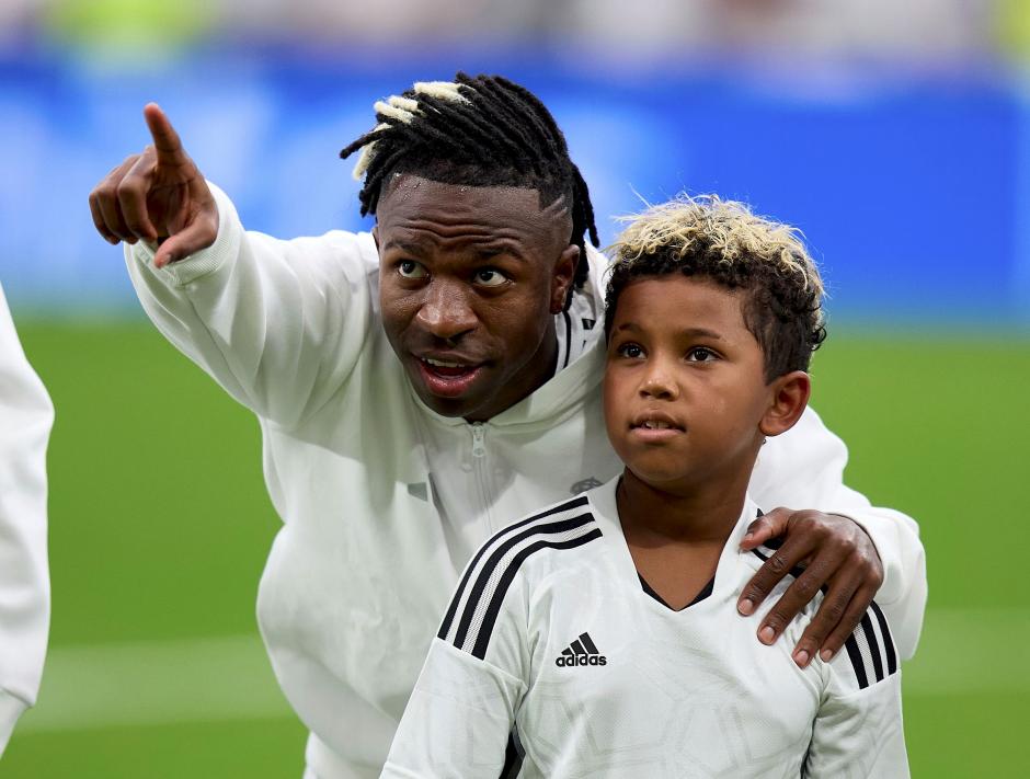 Soccerplayer Vinicius Junior with Saint West during Real Madrid v Real Valladolid, La Liga EA Sports match, date 2. Football, Santiago Bernabeu Stadium, Madrid, Spain - 25 Aug 2024