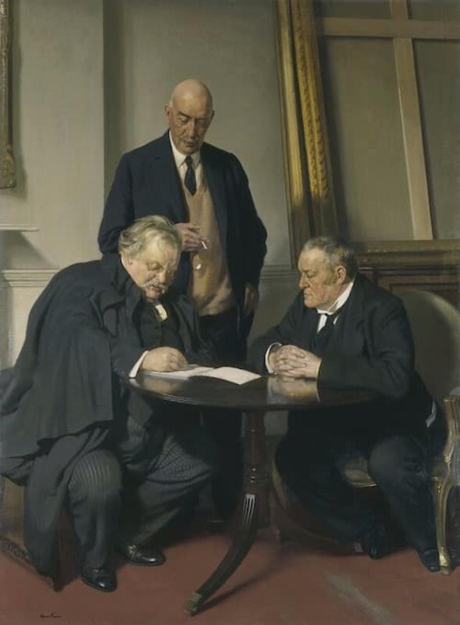 Chesterton (a la izquierda del espectador) y Belloc, con Maurice Baring de pie.