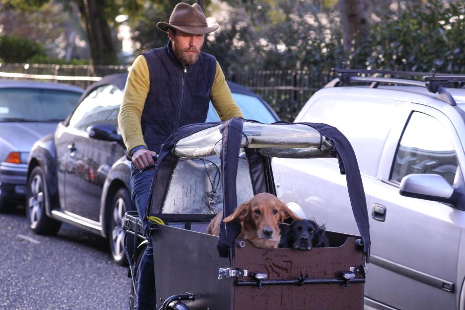 James Middleton is seen taking his dogs out for a ride on a special dog bicycle in Chelsea, London