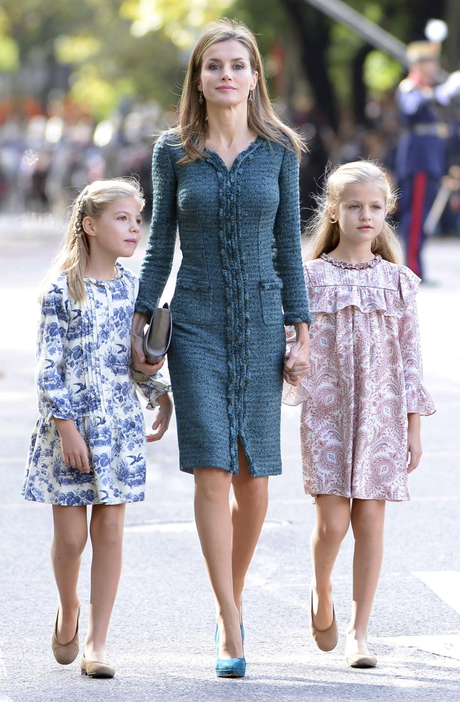 Spain's Queen Letizia Ortiz and her daughters princesses Leonor and Sofia of Borbon attending a military parade, during the known as Dia de la Hispanidad, Spain's National Day,  in Madrid, Spain, Sunday, Oct. 12, 2014.