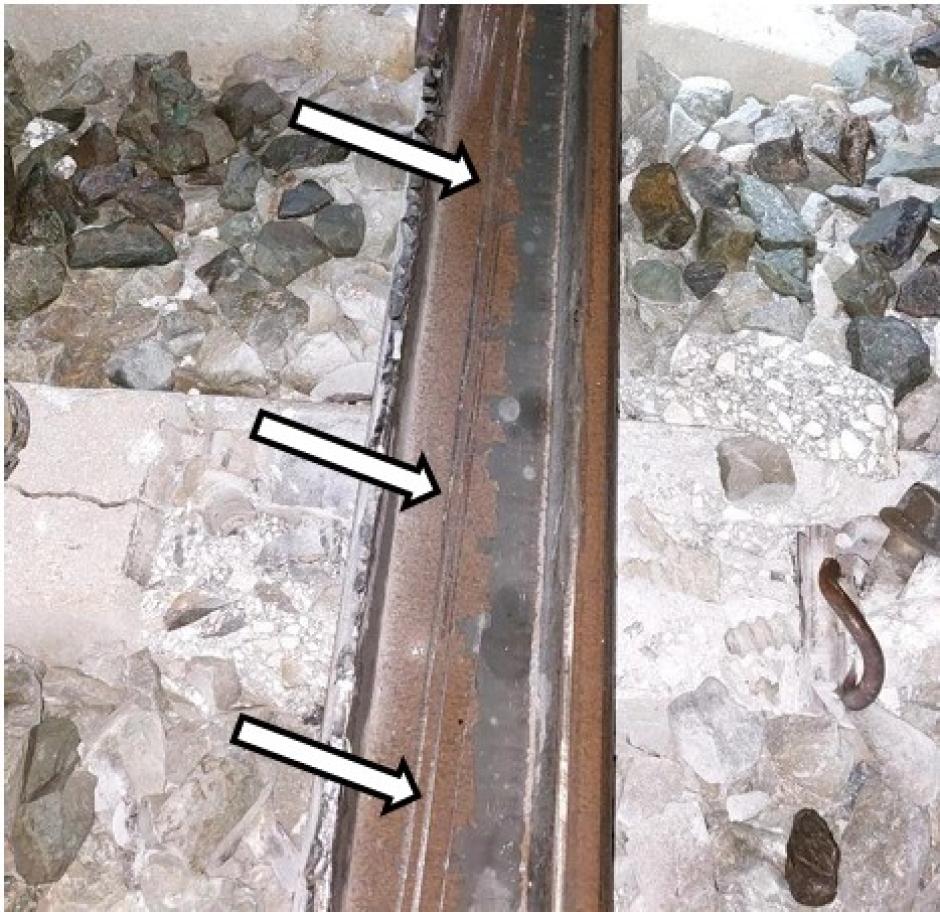 Carril tumbado hacia el exterior, tras el punto de rotura. Se observan en el alma del carril huellas de paso de ruedas del tren