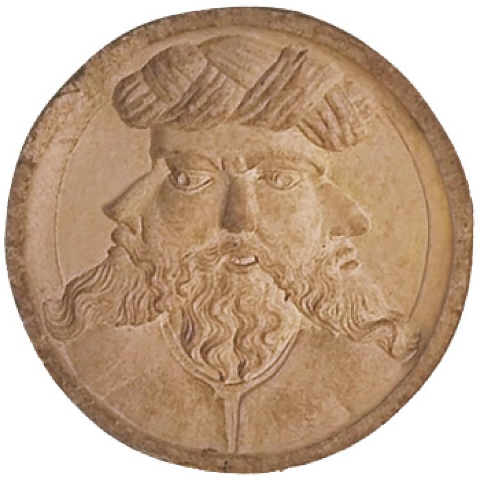 Imagen en bajorrelieve de una cruceta del convento de Cristo de Tomar (Portugal) representando una cabeza con varias facetas, un posible Baphomet.